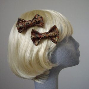 Black Gold Christmas Floral Bow Hair Clip side