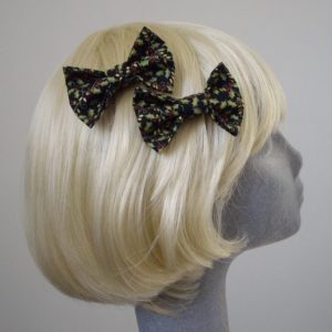 Black Christmas Holly Bow Hair Clip side