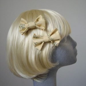 Cream Christmas Mistletoe Bow Hair Clip side