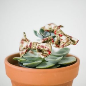 Ivory Christmas Holly Bow Hair Clip detail