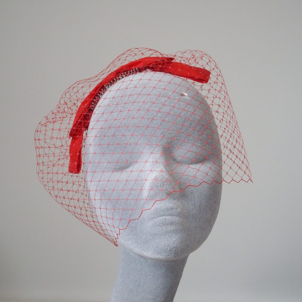 Red Ribbon Bow Fascinator with Birdcage Veil