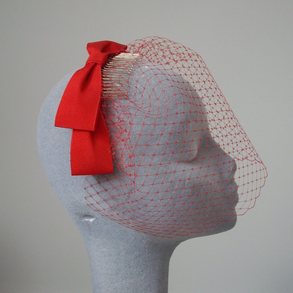 Red Ribbon Bow Fascinator with Birdcage Veil