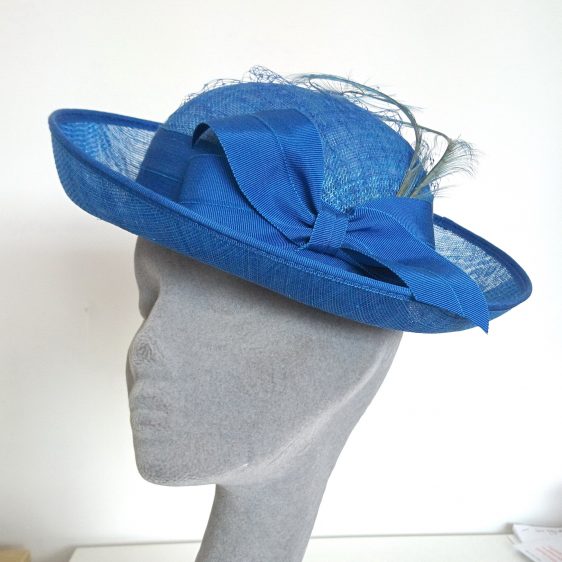 Bespoke Brimmed Hat by Imogen's Imagination, Royal Blue Sinamay Hat with Ribbon Bow and Curled Feathers - angle