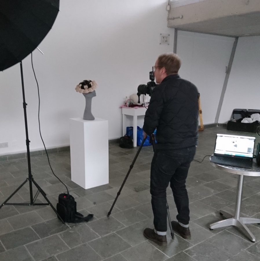 Mark Howe photographing a hat by Imogen's Imagination