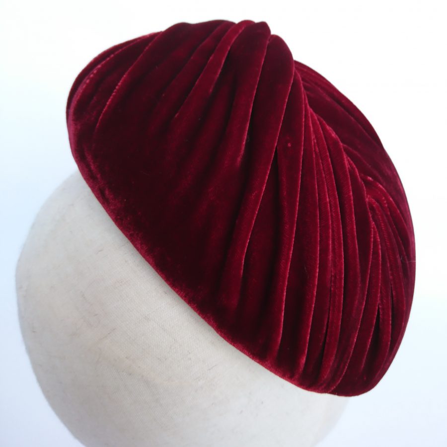 Ruched red velvet hat for Cheltenham Gold Cup
