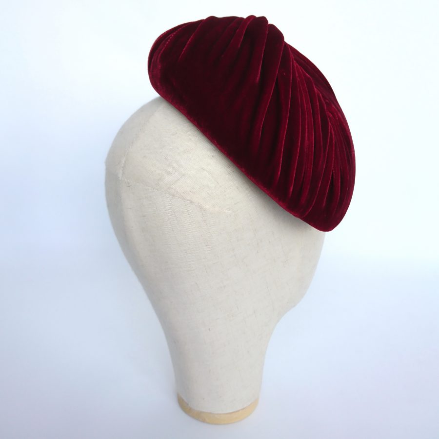 Detail of red velvet hat for spring race days