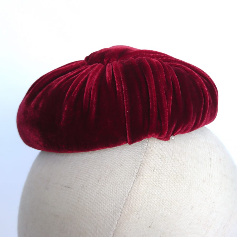 Detail of millinery technique pleated silk velvet hat