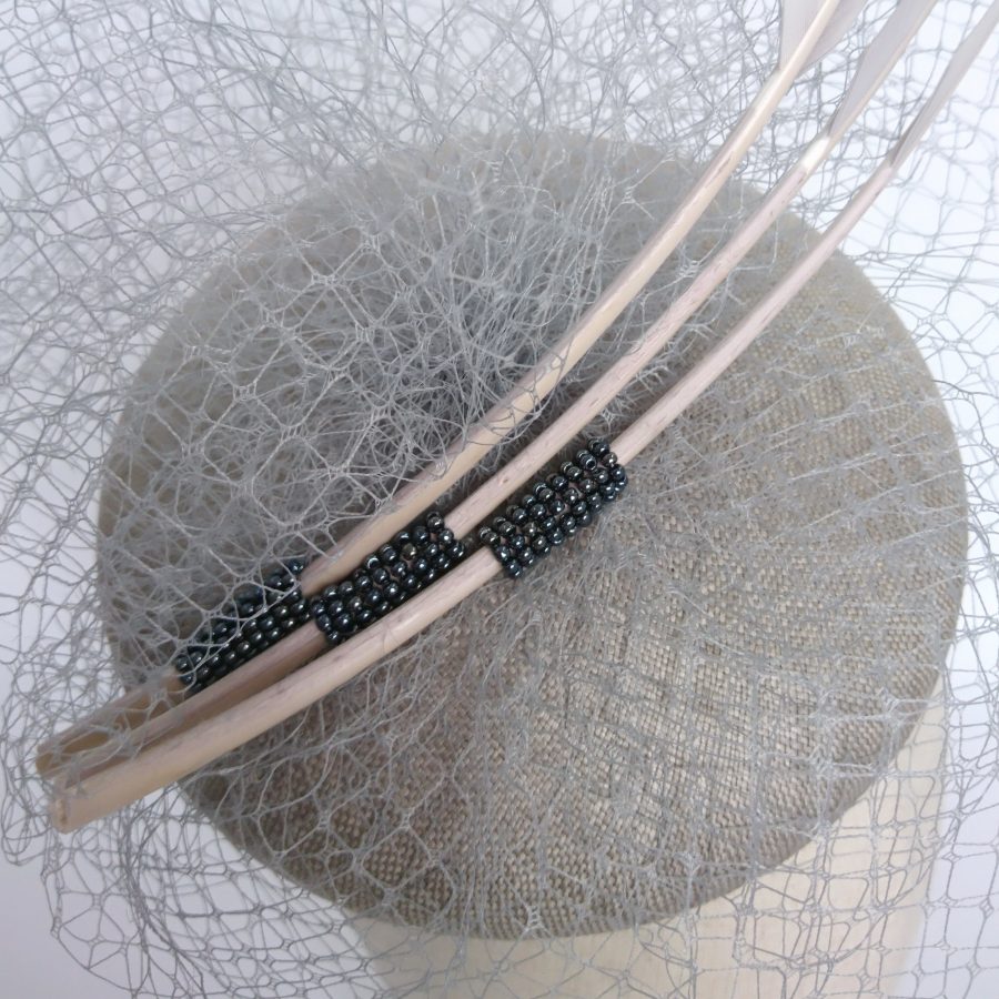 Detail of handsewn beads on a hat by Imogen's Imagination