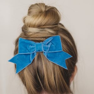 Turquoise Velvet Ribbon Hair Bow worn with a top knot bun