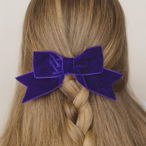 Purple Ribbon Hair Bow worn with a braid