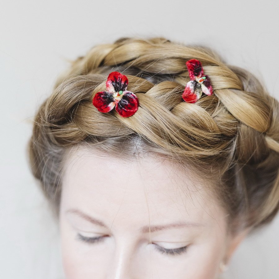Small Red Pansy Flower Hair Pins worn with a halo braid