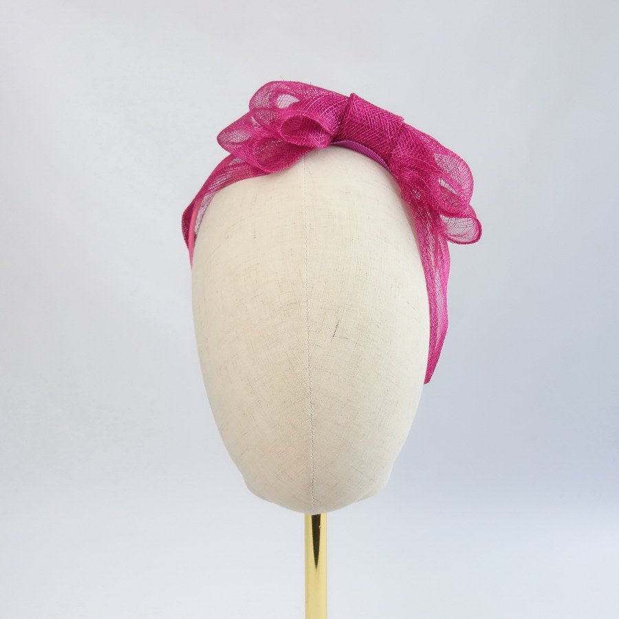 Dark Pink Feather Free Fascinators - Front view of Dark Pink Large Sinamay Bow Fascinator, worn to the left
