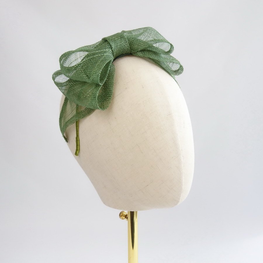 Green Bow Fascinators - side angle view, showing loops of the large, green sinamay bow.