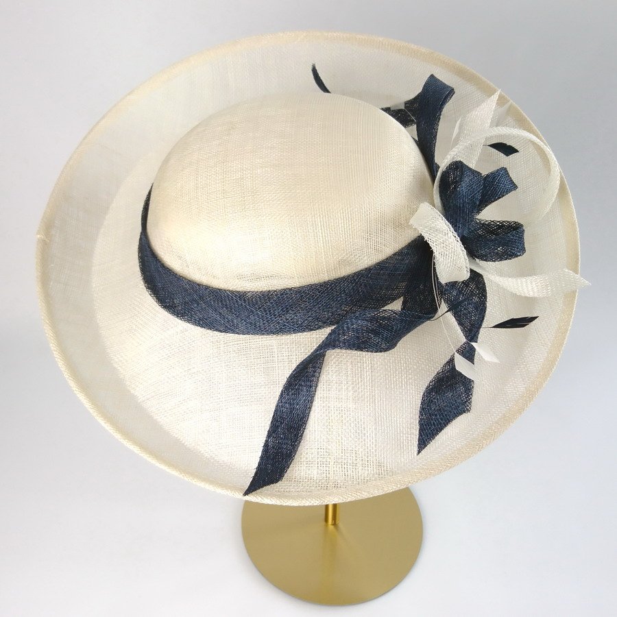 Ivory and Navy Blue Occasion Hat with a Brimt