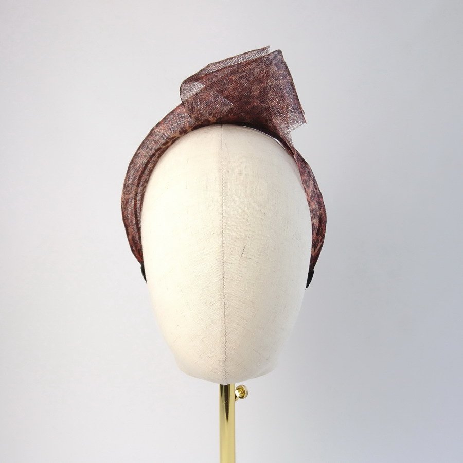 Leopard Crinoline Knot Headband worn to the left of the head