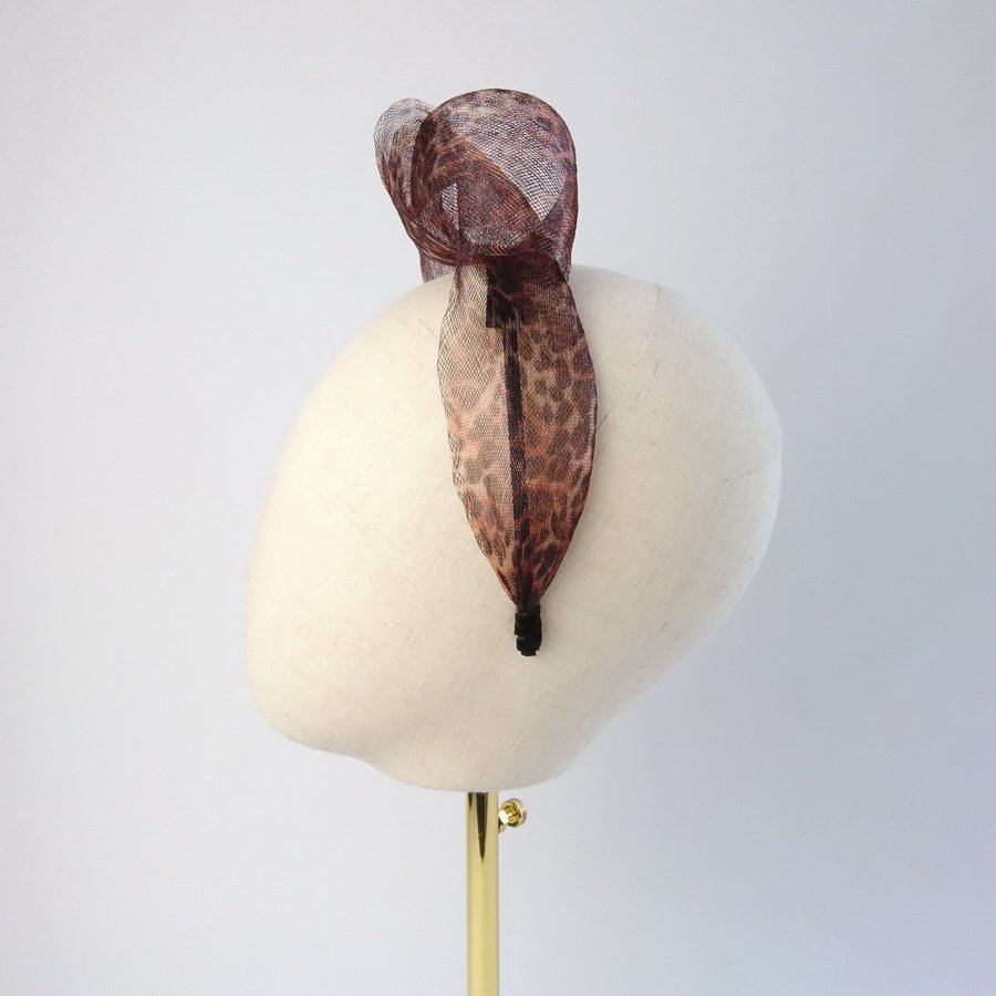 Leopard Crinoline Knot Headband worn to the left of the head