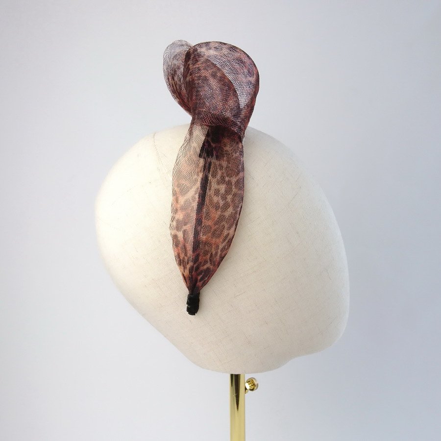 Leopard Crinoline Knot Headband worn to the right of the head