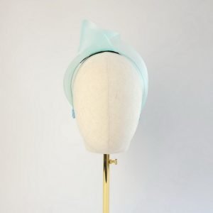 Aqua Blue Crinoline Knot Headband worn to the right of the head