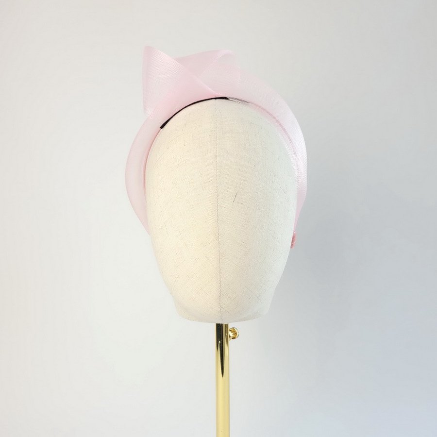 Pale Pink Crinoline Knot Headband worn to the right of the head