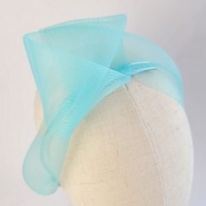 Turquoise Crinoline Knot Headband, detail of knot worn to the right of the head
