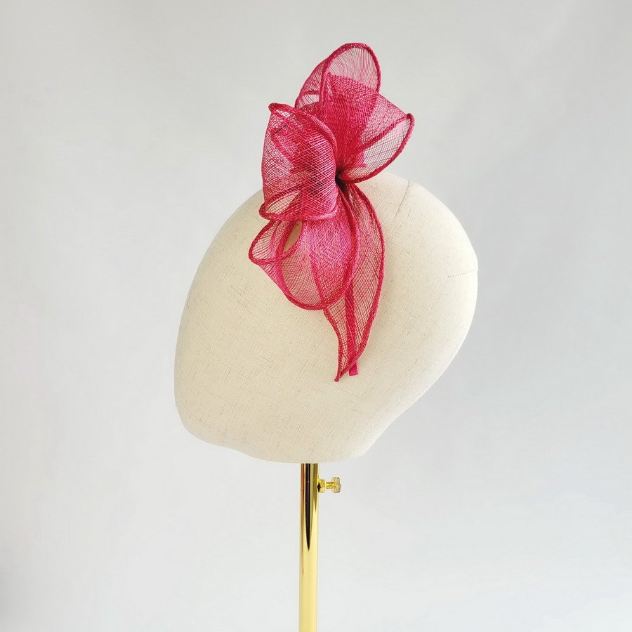 Handmade pink sinamay fascinator by Imogen's Imagination