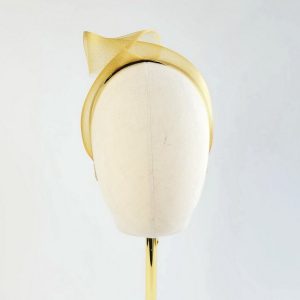 Mustard Yellow Crinoline Knot Headband worn to the right of the head