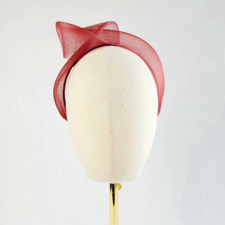 Wine Red Crinoline Knot Headband worn to the right of the head