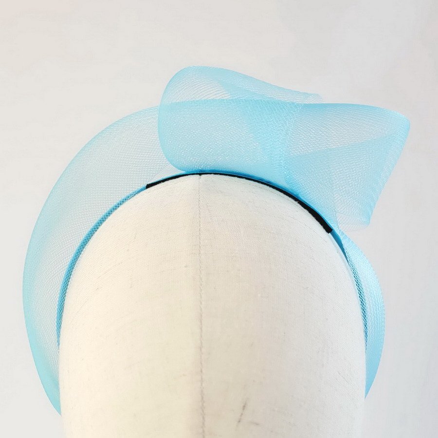 Peacock Blue Crinoline Knot Headband worn to the left of the head