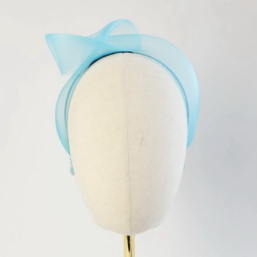 Peacock Blue Crinoline Knot Headband worn to the right of the head