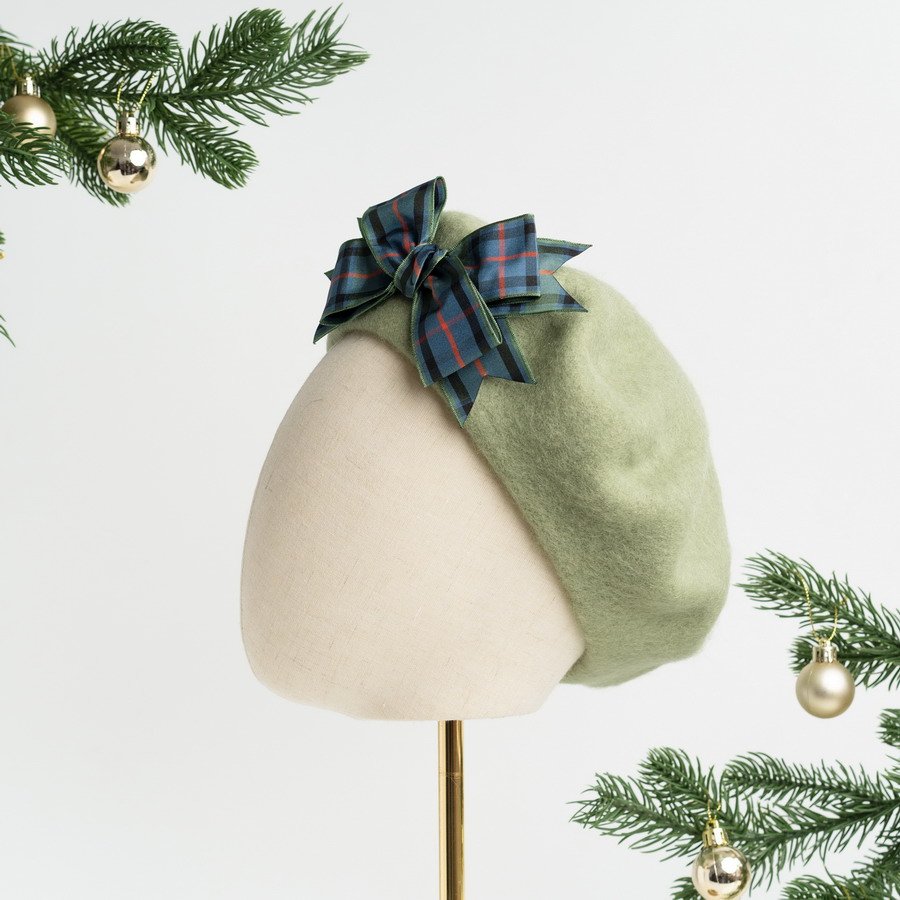 Sage green women's winter hat with handmade decoration by Imogen's Imagination