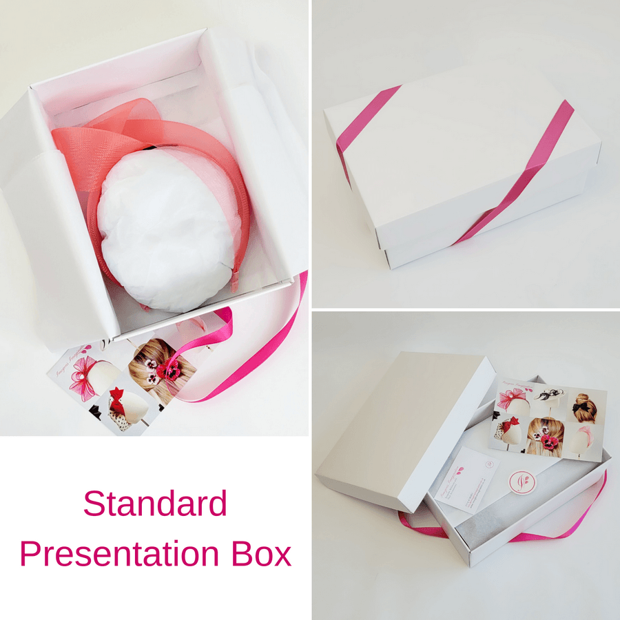 Coral Crinoline Knot Headband in standard white presentation box with pink ribbon