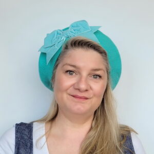 Duck Egg Blue Beret with Blue Velvet Ribbon Bow worn by a white woman in her 40s with long blonde hair