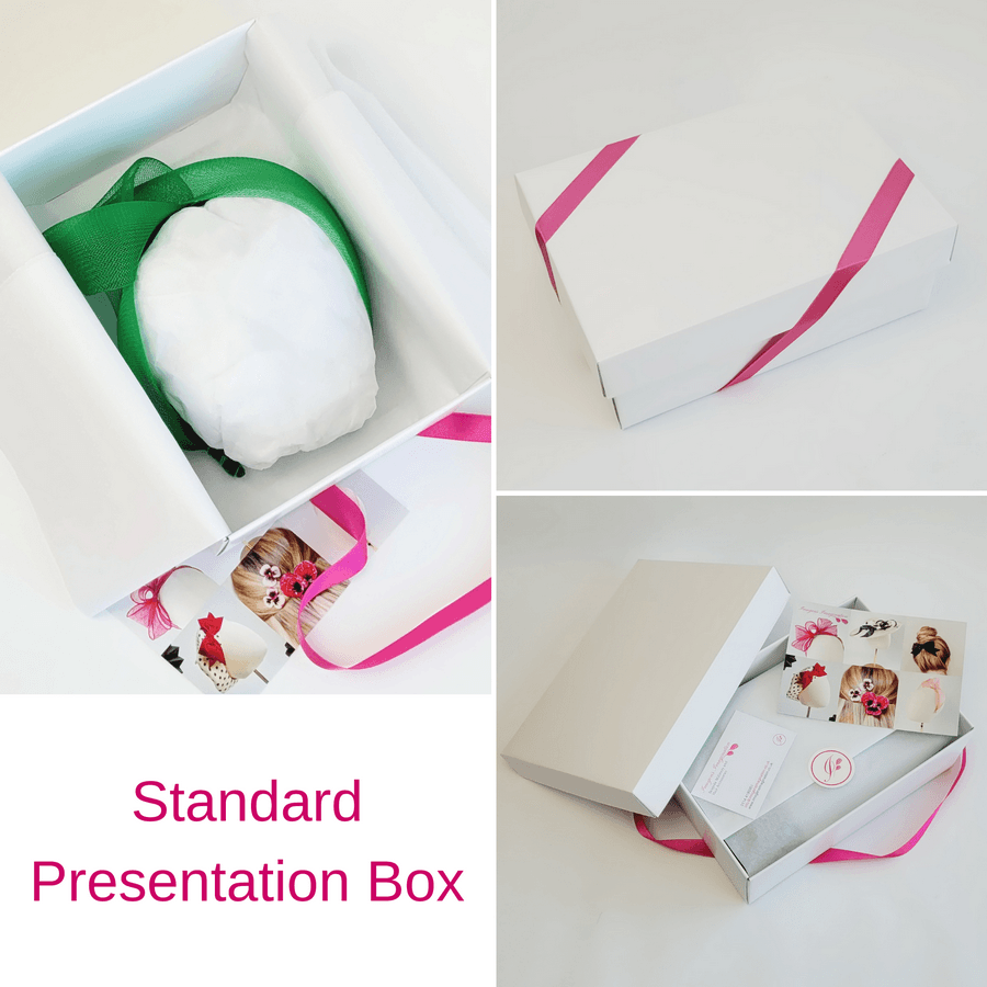 Emerald Green Crinoline Knot Headband in standard white presentation box with pink ribbon