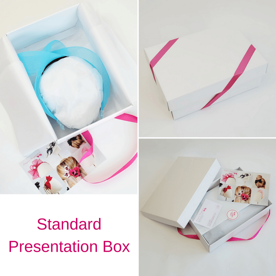 Peacock Blue Crinoline Knot Headband in standard white presentation box with pink ribbon