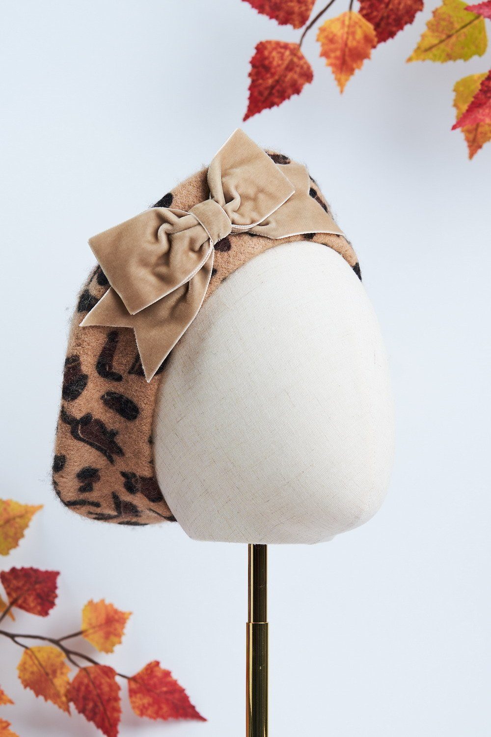 Shop the New AW22 Beret Collection featuring this Leopard Print Wool Felt Beret with a hand sewn Beige Velvet Ribbon Bow made by Imogen's Imagination